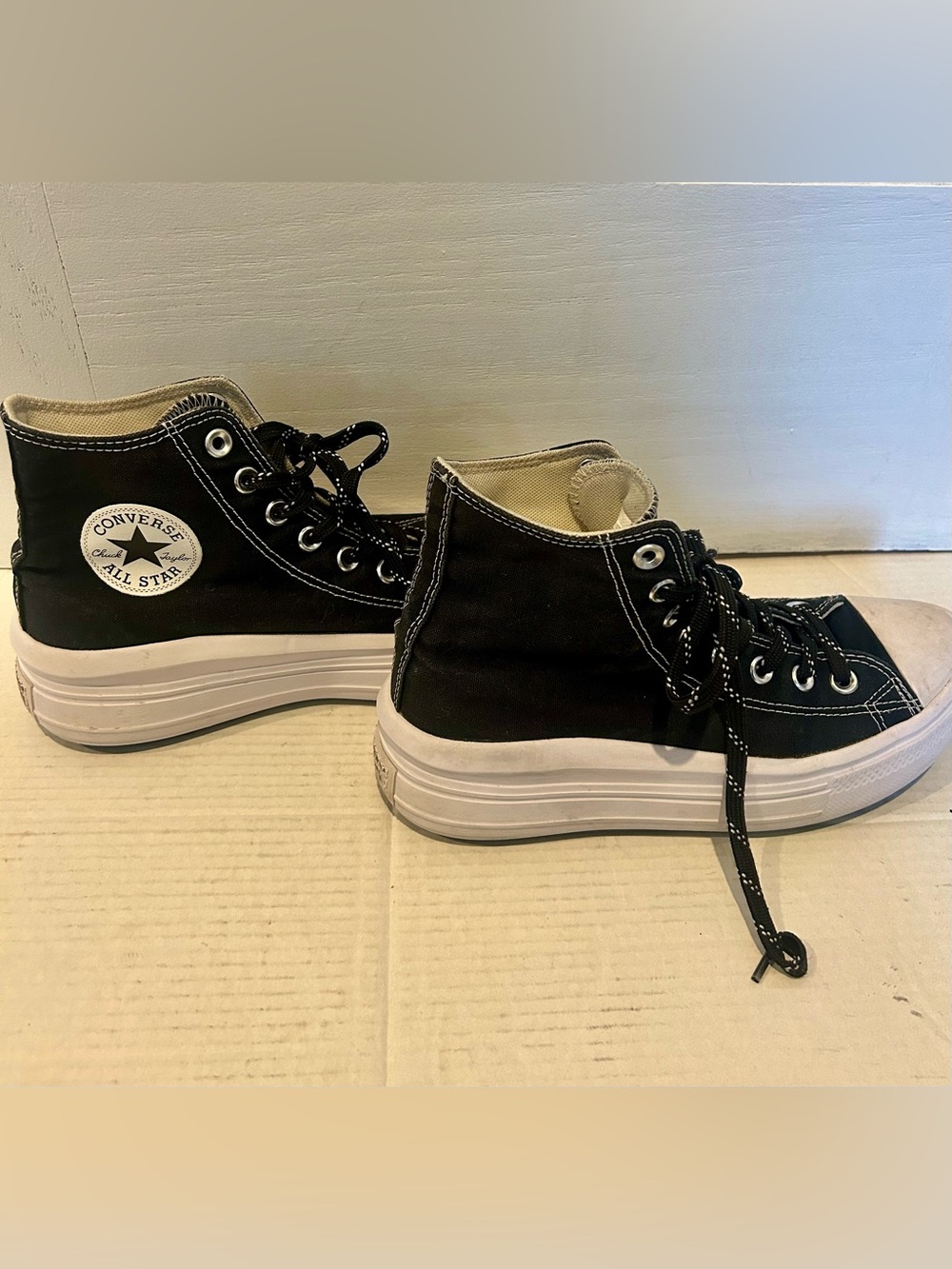 Converse Women’s Black High-Top Canvas Sneakers with White Sole